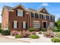 Beautiful brick house with well-maintained landscaping at 11917 Chevis Ct, Charlotte, NC 28277