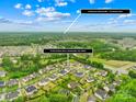 Beautiful aerial view of a residential community, highlighting the proximity to Downtown Huntersville at 15702 Guthrie Dr, Huntersville, NC 28078
