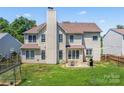 Expansive backyard featuring a patio, a grill and a fenced yard perfect for outdoor entertaining at 3124 Arklow Rd, Charlotte, NC 28269