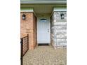 Welcoming front entrance features a white door with decorative lights at 975 22Nd Street Ne Pl, Hickory, NC 28601