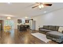 Open-concept living space features a modern kitchen, dining area, and comfortable seating at 2835 24Th Street Ne Dr, Hickory, NC 28601