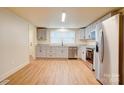 Bright kitchen boasts new stainless steel appliances, granite countertops, and new flooring at 405 Belva St, Kannapolis, NC 28081