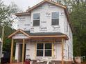 New construction home featuring a covered front porch and large windows at 115 Allen St, Rock Hill, SC 29730