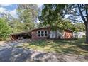 All brick home offering a covered parking area and a traditional, welcoming facade at 1239 Christopher Cir, Rock Hill, SC 29730