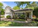 Charming single-story home boasts curb appeal with lush landscaping and a welcoming entrance at 16117 Wrights Ferry Rd, Charlotte, NC 28278
