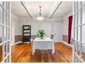 Elegant dining room features a white tablecloth, and an open doorway into the living room at 218 5Th Se St, Hickory, NC 28602