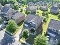 Spacious suburban home featuring a well-manicured lawn and landscaping in a peaceful neighborhood setting at 3424 Windstone Ln, Gastonia, NC 28056
