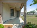 Inviting front porch featuring a well-maintained walkway and a view of the neighborhood at 1026 Kirby Dr, Fort Mill, SC 29715