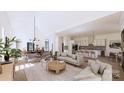 Bright open-concept living area with dining room and kitchen, perfect for entertaining at 4609 Firethorn Ct, Denver, NC 28037