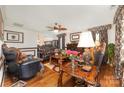 Elegant living room with hardwood floors, fireplace and luxurious decor exudes warmth and comfort at 636 Sadler Glen Dr, Charlotte, NC 28214