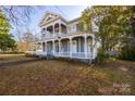 Two-story home with a inviting front porch, offering a blend of classic charm and curb appeal at 121 York St, Chester, SC 29706