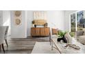 Contemporary living room showcasing stylish decor, wood flooring and modern accents at 2123 Gemway Dr, Charlotte, NC 28216