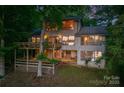 Back exterior of home with multiple decks perfect for outdoor entertainment and relaxation at 4749 16Th Street Ne Dr, Hickory, NC 28601