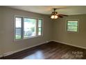 Bright bedroom with large windows offering ample natural light and hardwood flooring at 1824 Ebinport Rd, Rock Hill, SC 29732
