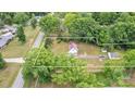 An aerial view highlighting the property's layout and the surrounding greenery and neighborhood at 3101 Hickory Hwy, Statesville, NC 28677