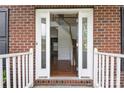 Inviting foyer with hardwood floors and staircase visible through the front door at 4015 Amber Leigh Way Dr, Charlotte, NC 28269