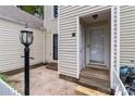 Close-up of the front entrance showcasing the house number and a classic light fixture at 407 Eastwood Dr, Salisbury, NC 28146