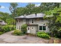 Rear view of home, showcasing architectural details and private backyard at 920 Queens Rd, Charlotte, NC 28207
