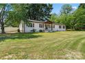 Exterior view of house and manicured lawn at 135 Mcshag Dr, Kannapolis, NC 28081