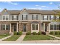 Charming townhomes showcase stone accents, manicured lawns, and inviting entryways, creating an appealing curb presence at 2037 Birchside Dr, Charlotte, NC 28205