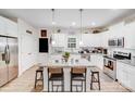 Bright, modern kitchen with granite counters, stainless steel appliances and island seating at 205 E Maine Ave, Bessemer City, NC 28016