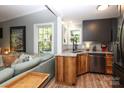 Stylish kitchen with wood cabinets, granite countertops, and stainless steel appliances at 8903 New Town Rd, Waxhaw, NC 28173
