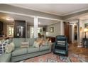 Open living space with hardwood floors, comfortable seating, and ample natural light at 8903 New Town Rd, Waxhaw, NC 28173