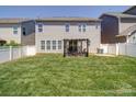 Well-maintained backyard with a pergola and outdoor seating area at 1020 Equipoise Dr, Indian Trail, NC 28079