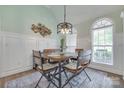 Cozy dining area with modern table set, decorative wall art, and lots of natural light at 1342 Crown Ridge Dr # 38, Fort Mill, SC 29708