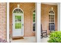 Inviting front porch with rocking chairs and ample seating area, perfect for relaxing outdoors at 1342 Crown Ridge Dr # 38, Fort Mill, SC 29708