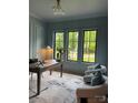 Comfortable office space featuring neutral walls, natural light, and stylish décor at 1807 Arnold Dr, Charlotte, NC 28205