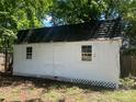 Storage shed with windows and double doors providing great storage capacity at 353 Quail Pointe Dr, Salisbury, NC 28147