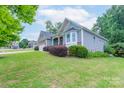 Well-maintained home with manicured lawn and landscaping, including a two-car garage at 968 Autumn Glen Ct, Clover, SC 29710