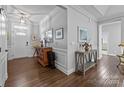 Elegant foyer features hardwood floors, tasteful decor, and ample natural light, creating a warm welcome at 11621 Mount Argus Dr, Cornelius, NC 28031