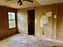 Bedroom space showing patched walls and closet access at 163 Shanna Ln, Statesville, NC 28625