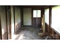 Enclosed porch featuring a doorway and window at 163 Shanna Ln, Statesville, NC 28625