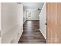 Entryway with coat rack and hardwood flooring at 2751 Bramble Ridge Ct, Charlotte, NC 28215