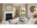 Inviting living room featuring a modern fireplace and lots of natural light at 414 Janie Nw Cir, Newton, NC 28658