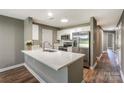 Modern kitchen featuring stainless steel appliances and a bright, white countertop at 104 Pier 33 Dr # 312, Mooresville, NC 28117