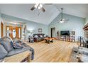 Bright living room boasts vaulted ceiling, hardwood floors, and comfortable seating at 1221 Edgefield Rd, York, SC 29745