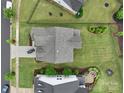 An aerial view showcasing the property's backyard, landscaping, firepit, and proximity to nearby homes at 1287 Fishing Creek Rd, Lake Wylie, SC 29710