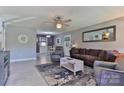 Inviting living room with contemporary furniture, ceiling fan, and neutral decor at 174 Stewart Acres Dr, Statesville, NC 28677