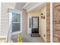 Inviting front entrance with a stylish door, charming details, and a pleasant exterior paint scheme at 44449 Oriole Dr # 101, Indian Land, SC 29707