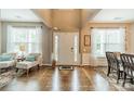 Inviting foyer with hardwood floors, high ceilings, and lots of natural light at 8707 Darcy Hopkins Dr, Charlotte, NC 28277