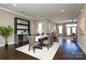 Open-concept dining room with a stylish bar area, perfect for entertaining guests and Gathering gatherings at 926 Steel House Blvd, Charlotte, NC 28205