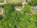 An aerial view highlights the property's location, surrounded by lush greenery and nearby streets at 10420 Silver Mine Rd, Indian Land, SC 29707