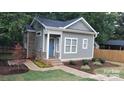 Inviting home with attractive siding, brick accents, and landscaped front yard at 1101 Spruce St, Charlotte, NC 28203