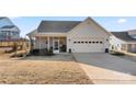 This home offers a convenient attached two-car garage and a cozy screened-in porch for outdoor relaxation at 11249 Island View Ln, Lancaster, SC 29720