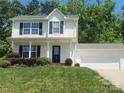 Charming two-story home with black shutters and a well-maintained front yard at 121 Marcella Dr, Kings Mountain, NC 28086