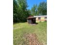Backyard view of gazebo and grassy area at 143 Greenville Blvd, Bessemer City, NC 28016